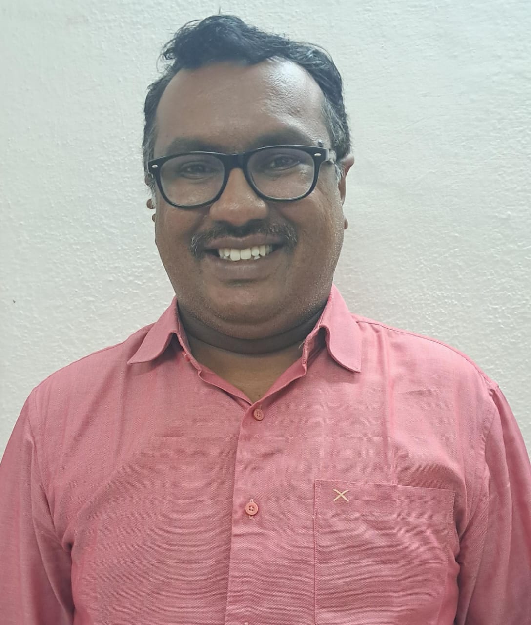 Mr. NELATURI DAVID RAJU